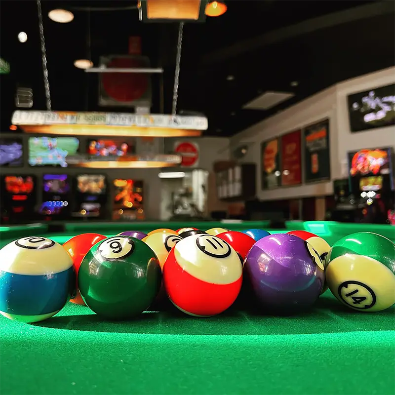 racked billiards balls at Carpool